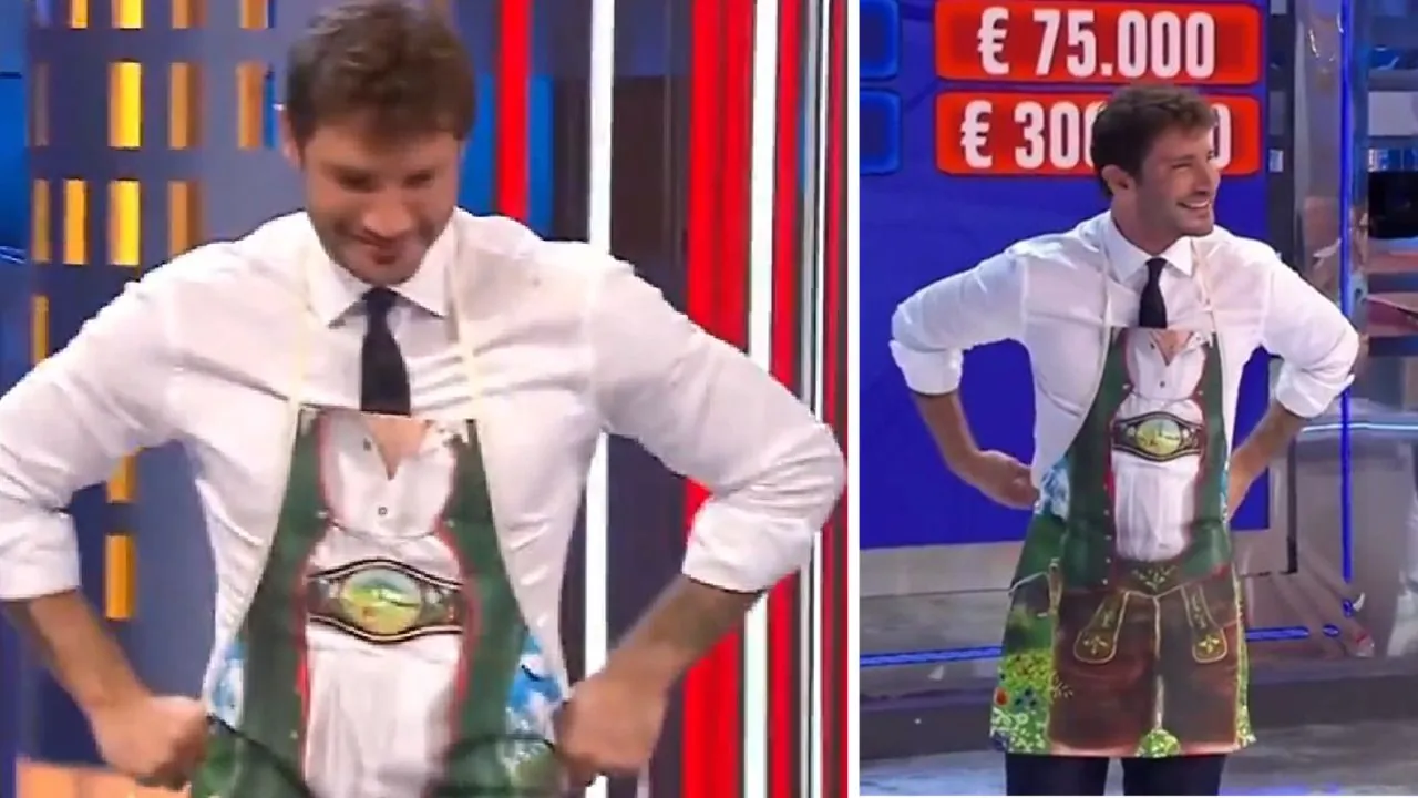 Stefano De Martino riceve in regalo un grembiule ad Affari Tuoi